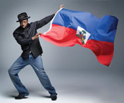 wyclef jean with haitian flag