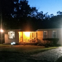 renovated house with llights on